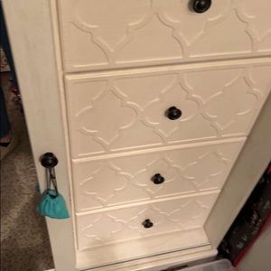 dresser with sliding mirror, 3 big shelves behind it. 4 drawers included on side